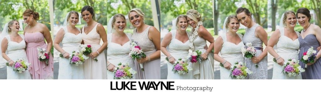 Bridesmaids posing for a group photo in a garden, holding bouquets and smiling.