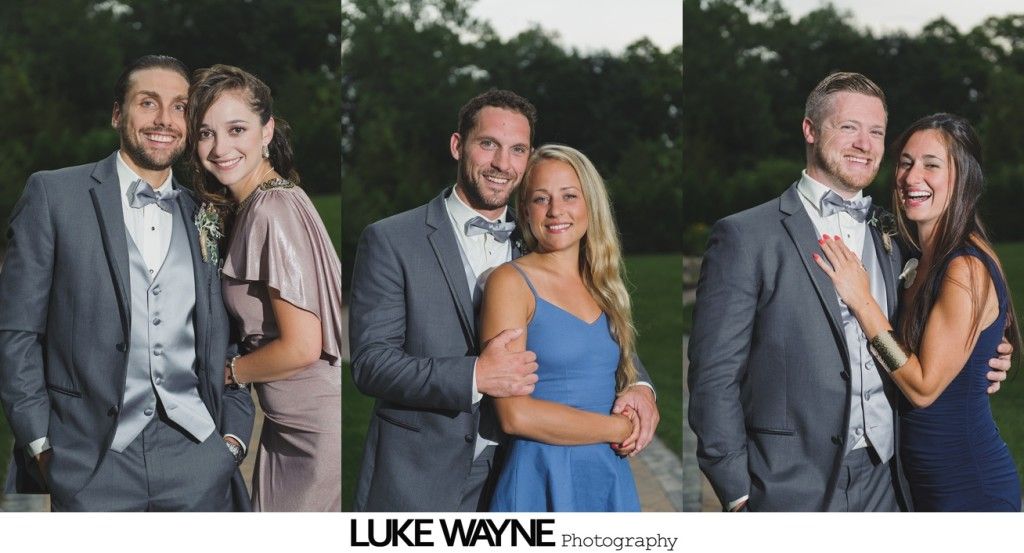 Three couples posing outdoors; men in suits, women in dresses; smiling, natural lighting.