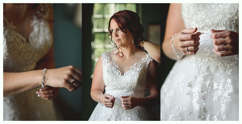 Couple walking under an umbrella in a park, smiling. Trees line the path, overcast sky. Black and white photo.