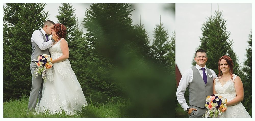 Diamond engagement ring on yellow flower in tall grass.