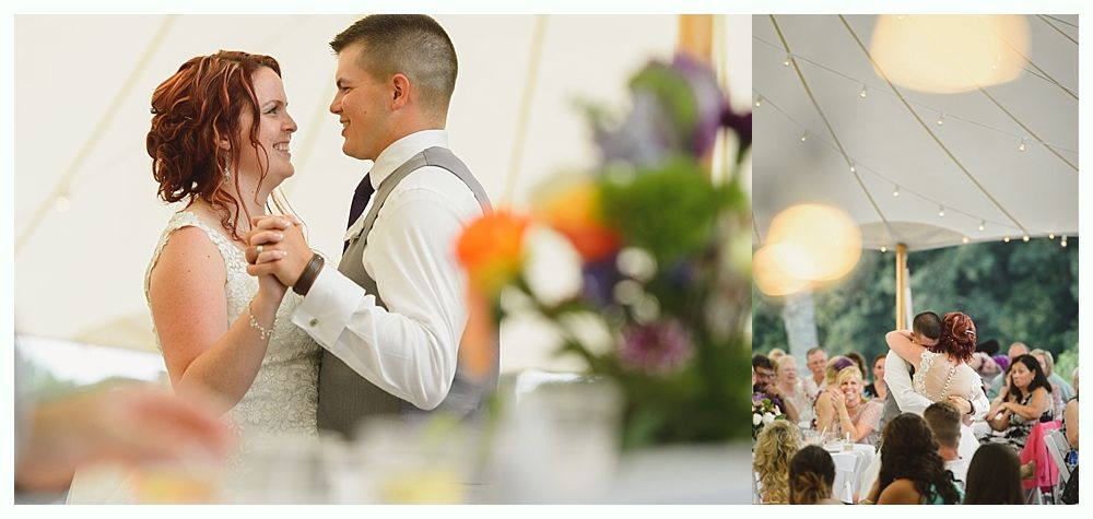 Diamond engagement ring on yellow flower in tall grass.
