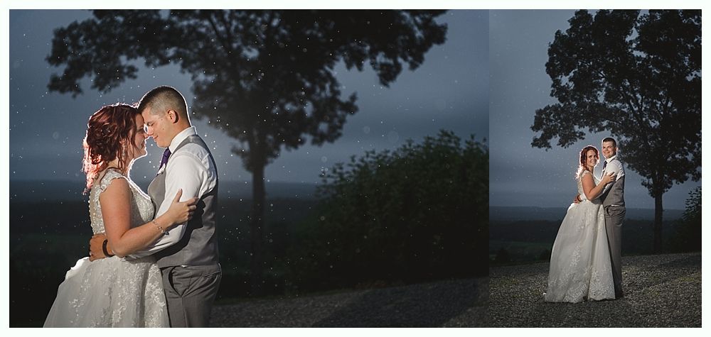 Diamond engagement ring on yellow flower in tall grass.