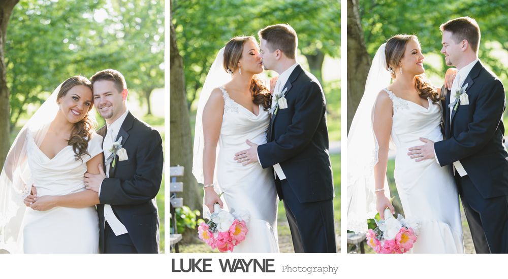 Bride and groom posing for photos outside, in wedding attire. They are smiling, kissing, and holding hands.