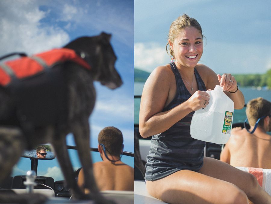 Two men in suits stand on a road. One has arms crossed, a yellow tie. The other is beside him, also in a suit, with dark sunglasses.