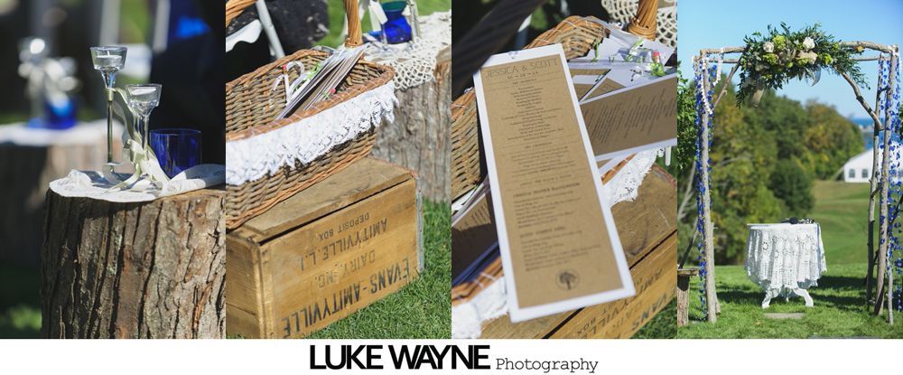 Newlyweds embrace in a pumpkin patch with a blue sky background. The bride wears a white dress, the groom a black suit.