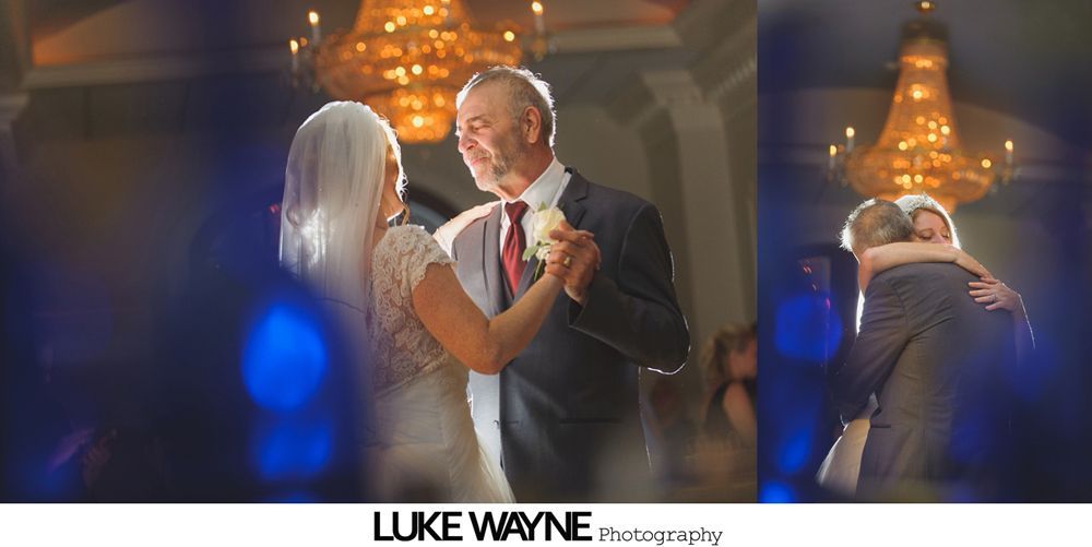 Wedding reception with dancing; bride in a white gown and guests in colorful dresses on a dance floor.