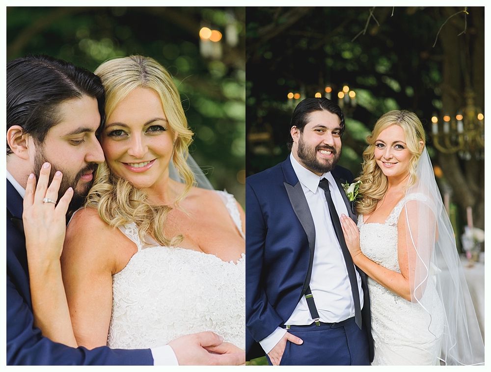Wedding couple posing for photos outdoors; the woman in white dress, the man in a dark blue suit.