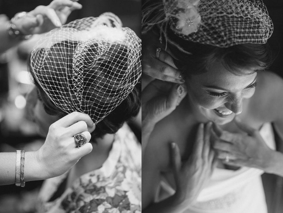 Bride being helped with her veil and earrings. Smiling, hands adjusting accessories, in soft focus.