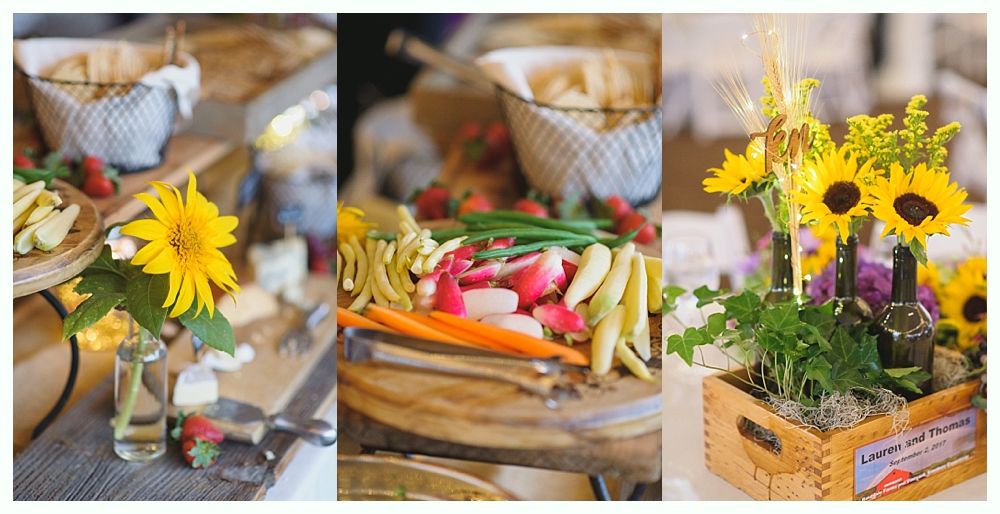 Buffet with sunflower decor, featuring cheese, veggies, and bread.