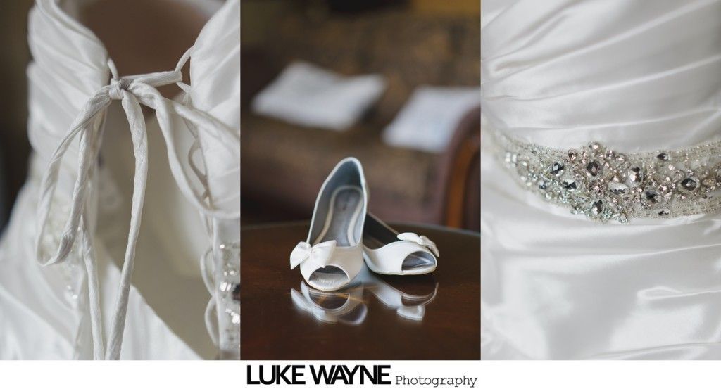 Wedding dress detail: tied bodice, shoes, jeweled belt.