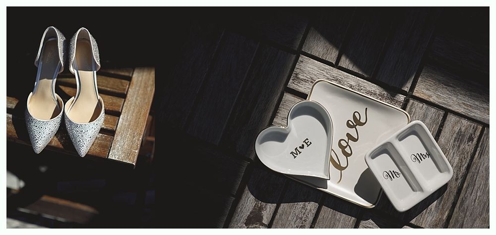 Wedding shoes and ring dishes on a wooden surface; the dishes have 