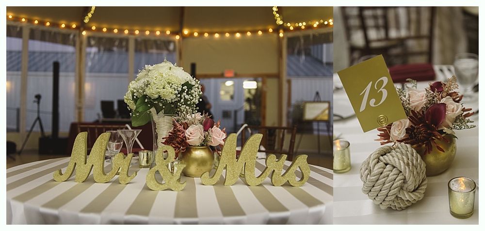 Man in suit laughing with mouth wide open at an event.