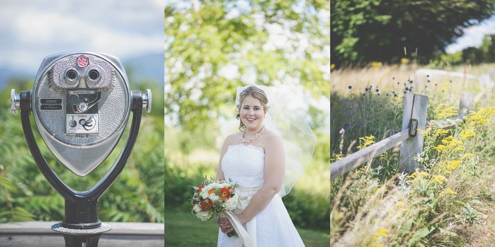 Bride and groom in wedding attire walking and kissing on a tree-lined road.
