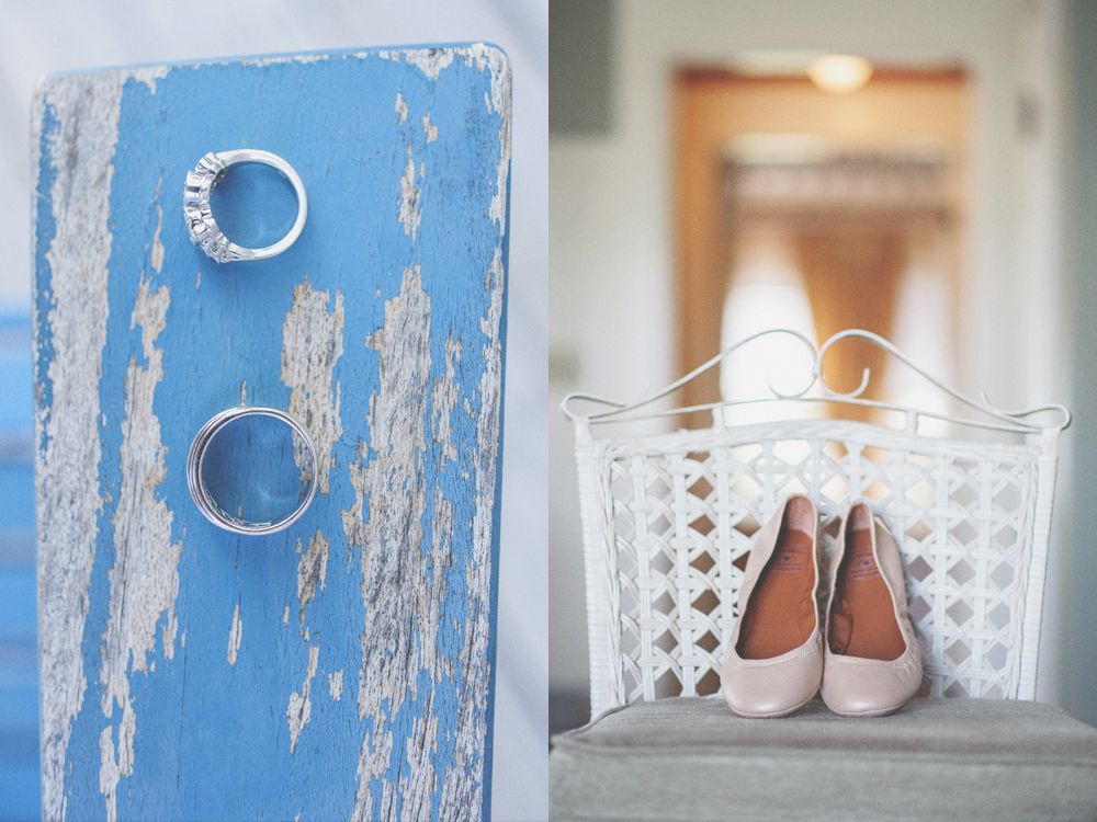 Bride in a white strapless gown adjusts her earring, then smiles holding sunflowers; indoors, window light.