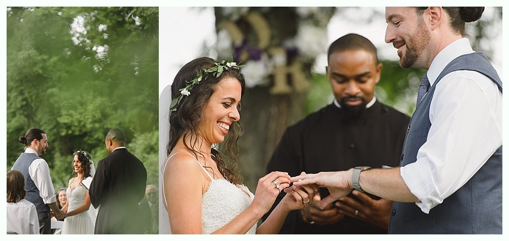 Wedding ceremony: bride and groom exchanging rings. A pastor officiates outdoors, greenery in background.