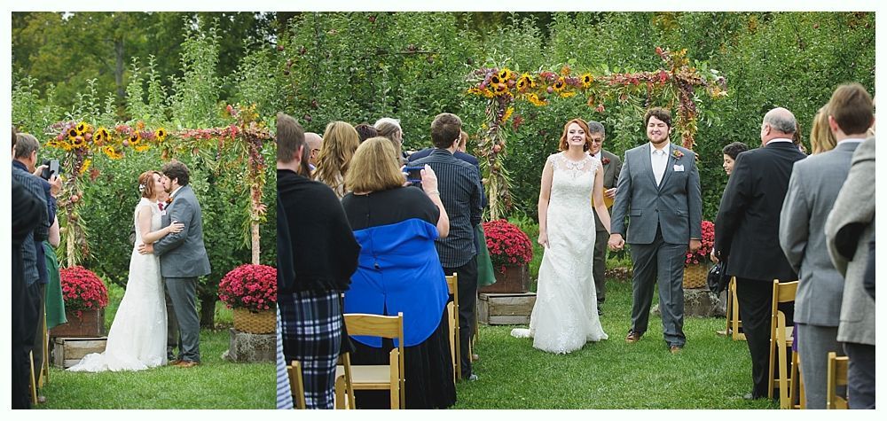 Wedding ceremony with couple walking down the aisle after exchanging vows. Attendees seated in the background.