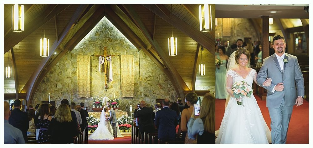 Couple exits church after their wedding. Bride in white dress, groom in gray suit, red carpet.