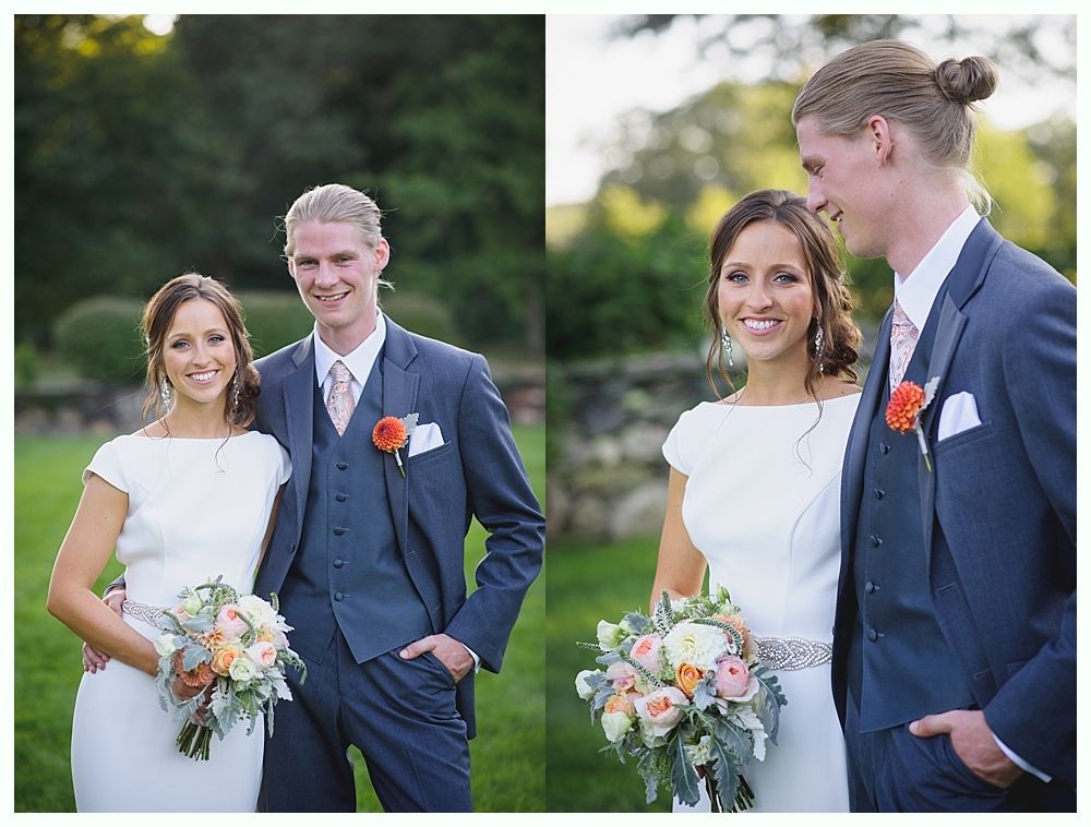 Bride with arms up, making a funny face, groom looking at his hand, cake cutting in background.