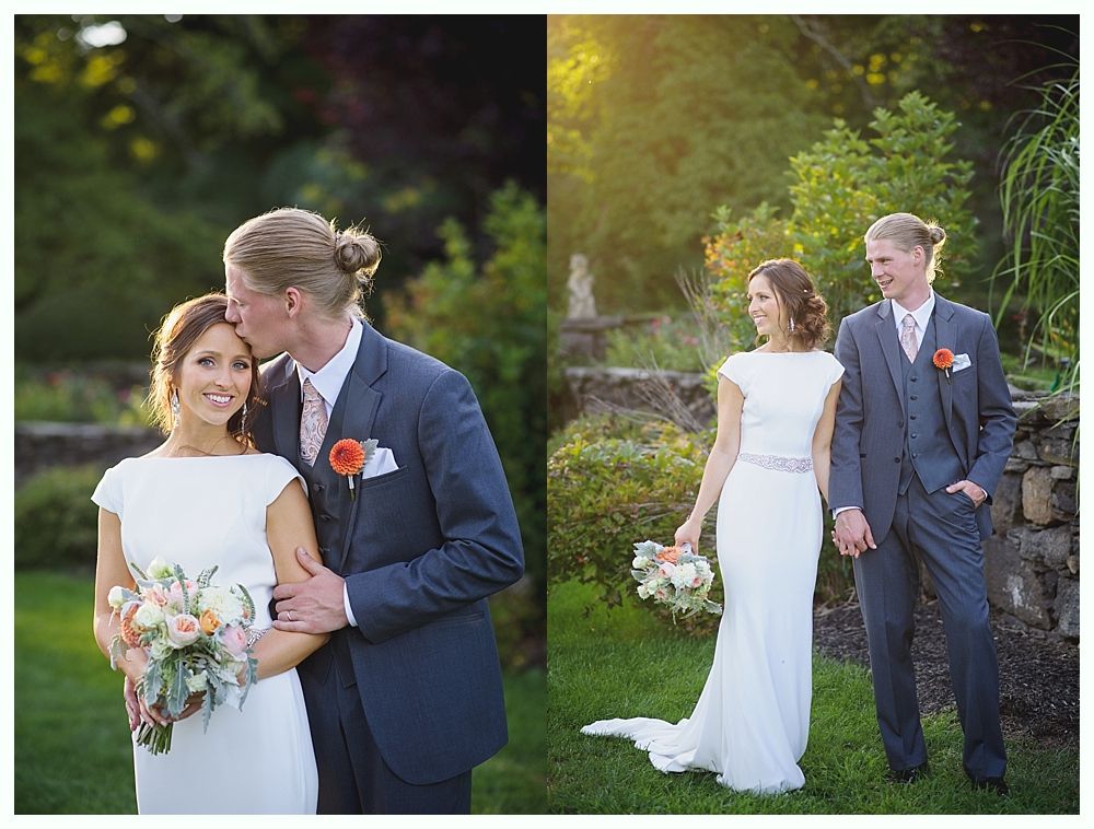 Bride with arms up, making a funny face, groom looking at his hand, cake cutting in background.