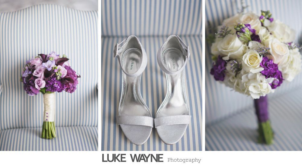 Woman wearing a hat with veil and feathers, in black and white.