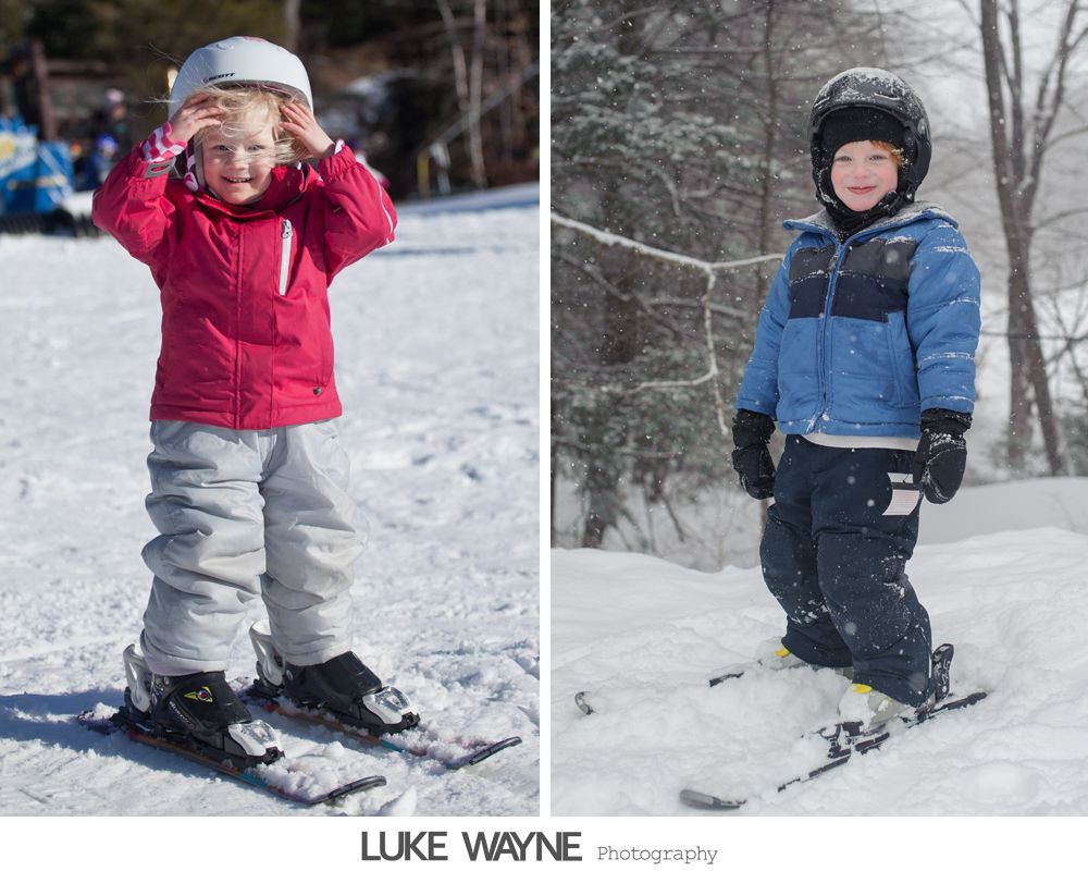 Wedding rings, bouquet, and embellished shoes arranged on dark blue fabric.