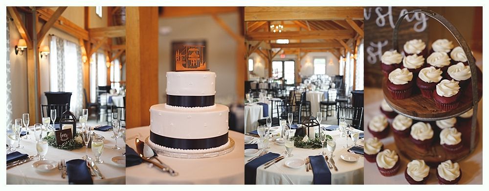 Wedding reception setup with cake, cupcakes, and decorated tables in a wood-beamed hall.