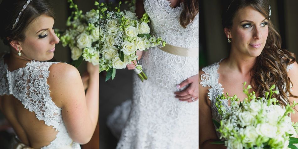 Bride in white lace wedding dress, holding bouquet. Open back detail, looking to the side with a serene expression.
