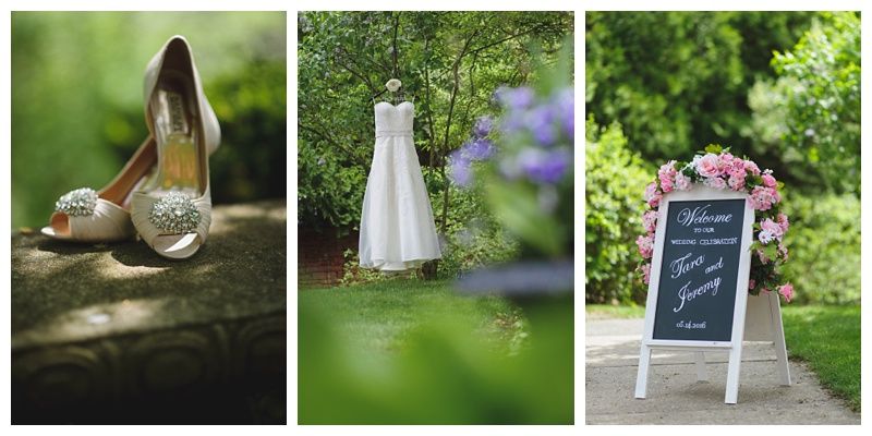 Bride and bridesmaids in navy dresses hold bouquets, posing outdoors.