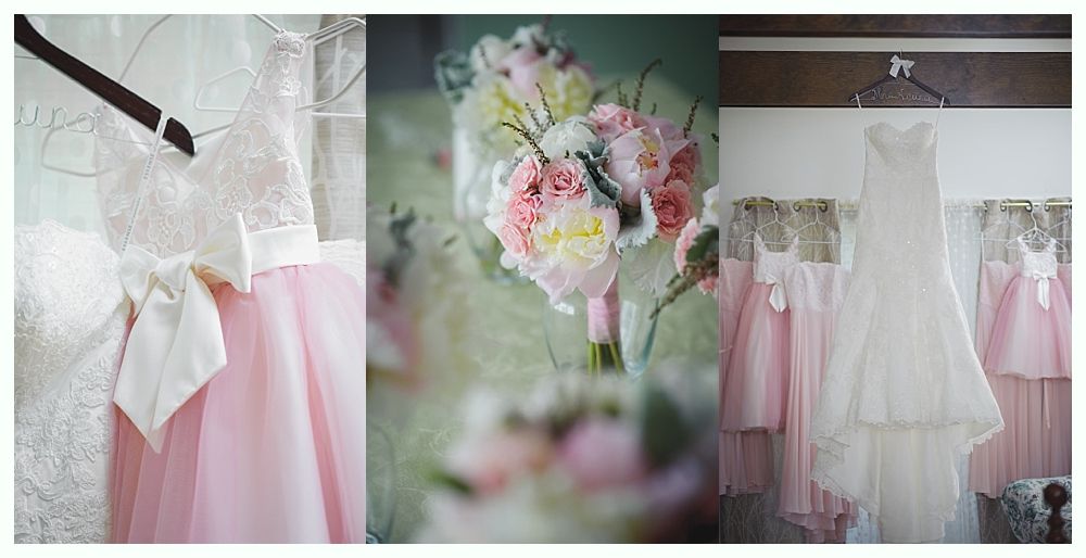 Groom and groomsmen on a beach, wearing suits. Groom in navy pants, others in khaki. All with blue ties, ocean in background.