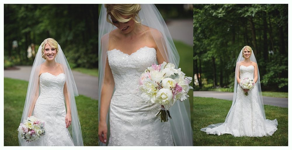 Bride with arms up, making a funny face, groom looking at his hand, cake cutting in background.