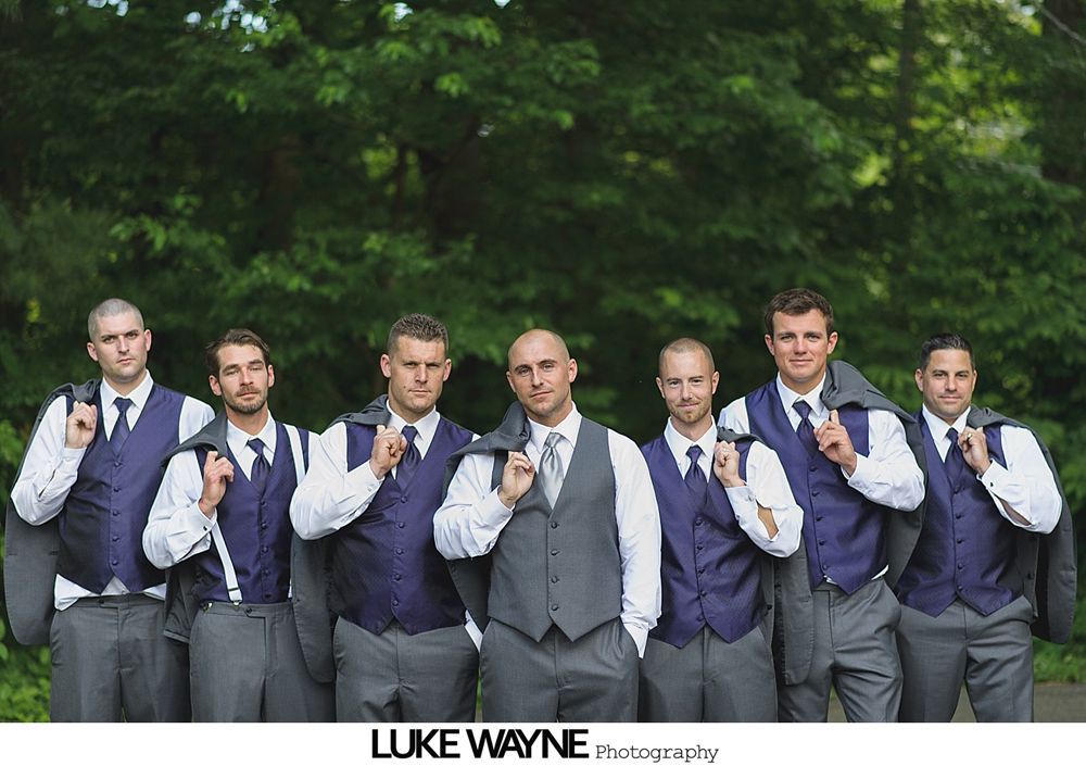 Two wedding rings on a weathered green book.