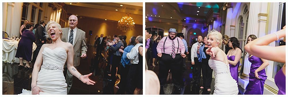 Bride dancing at a wedding reception, other guests visible in background.