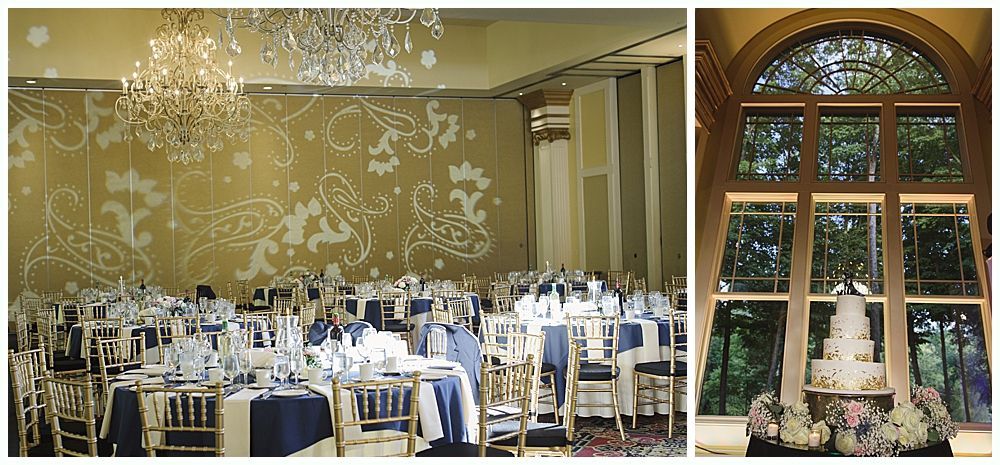 Wedding reception hall with tables and cake.