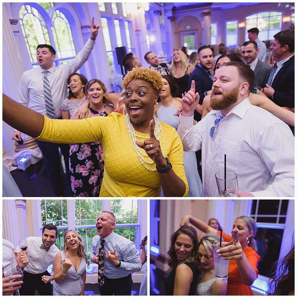 People dancing and celebrating at a party in a well-lit room.