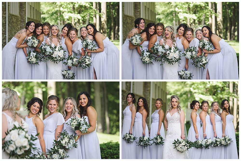 Bridesmaids in light blue dresses with bouquets smile and pose with the bride. Exterior shot.