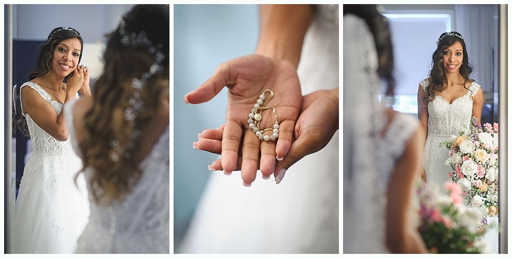 Bride in white wedding dress adjusts earring, holds jewelry, and poses with flowers.