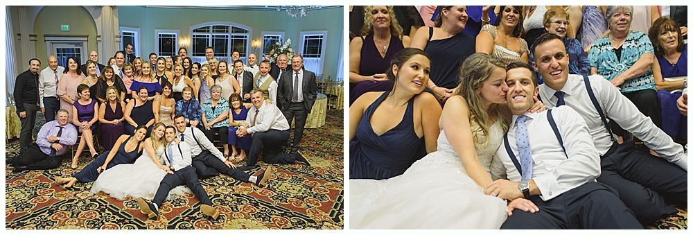 Wedding group photo. Bride and groom pose with bridesmaids and groomsmen inside.