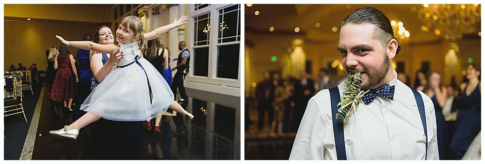 A child in a white dress is being held up by an adult; a man with a beard is chewing on greenery.