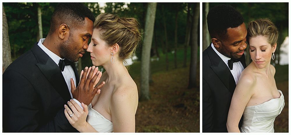 Couple embracing at their wedding, standing near trees. The groom's hands are on the bride's shoulders.