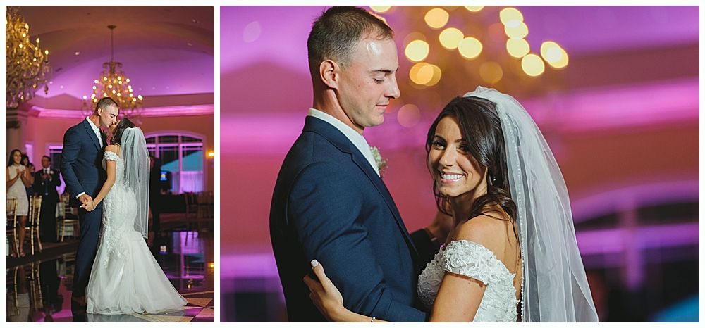 Newlyweds dance at reception, the bride smiling at camera.