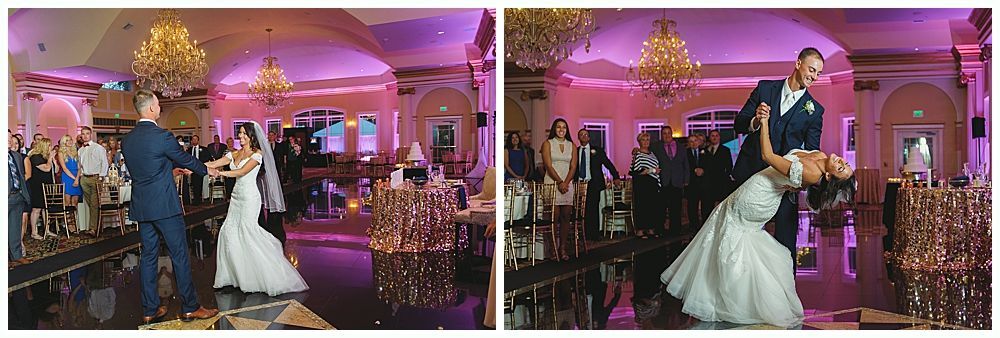 Bride and groom dancing at wedding reception. Indoor setting with pink lighting and chandeliers.
