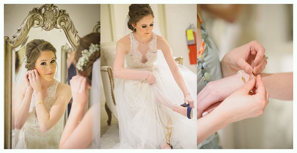 Bride getting ready: putting on earrings, shoes, and bracelet. White dress, ornate mirror, soft focus.