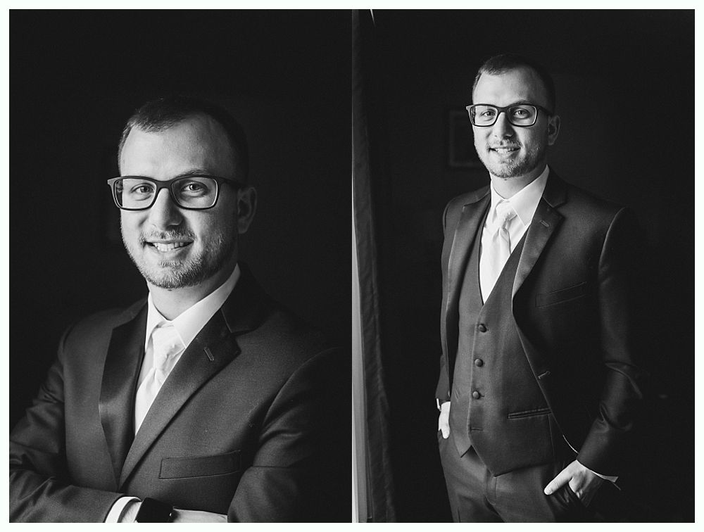 A man in a suit, wearing glasses, smiling against a dark backdrop. Two-panel black and white portrait.