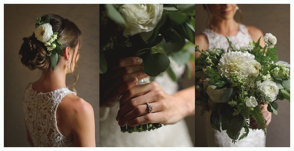 Bride with updo, floral hairpiece, holding bouquet with white blooms.