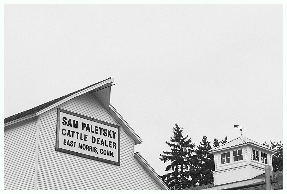 Sign on building: Sam Paletsky, Cattle Dealer, East Morris, Conn.