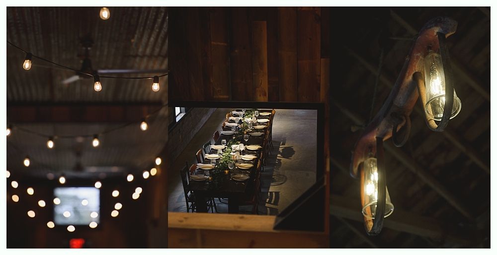 String lights illuminate a rustic room with long tables set for a gathering.