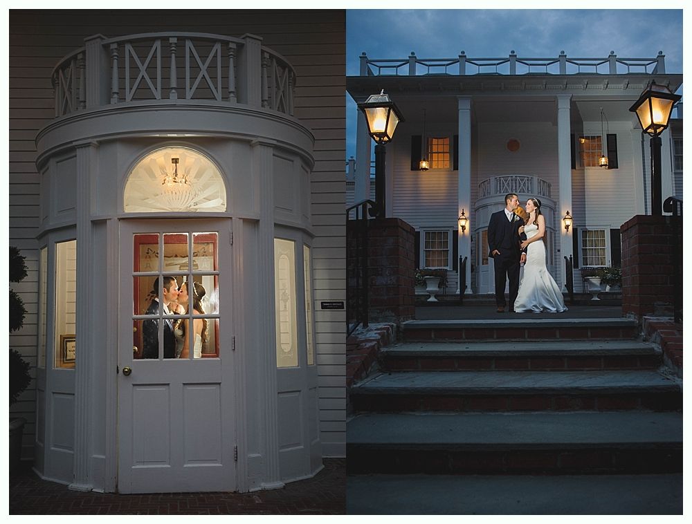 Bride with arms up, making a funny face, groom looking at his hand, cake cutting in background.
