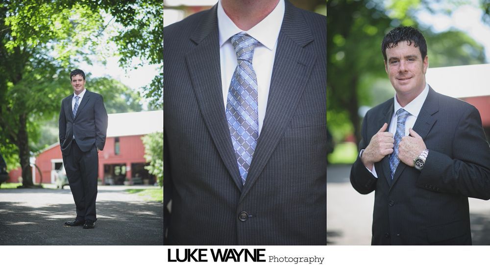 Bride holding bouquet, smiling in a room. Bridesmaids in the background.
