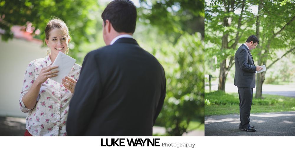 Bridesmaids in pastel dresses and bride in white, walking down a road, holding bouquets, sunny day.