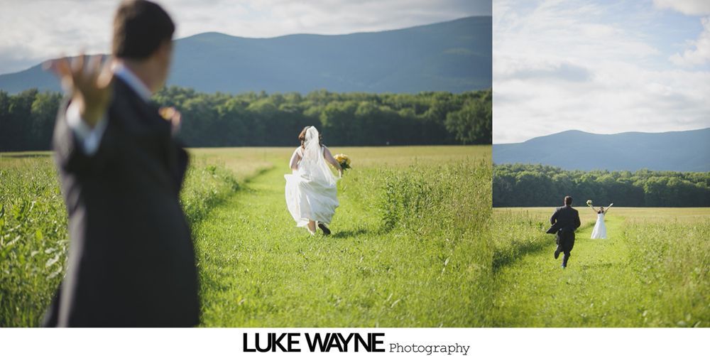 Woman embracing another, both smiling; indoors, event setting.